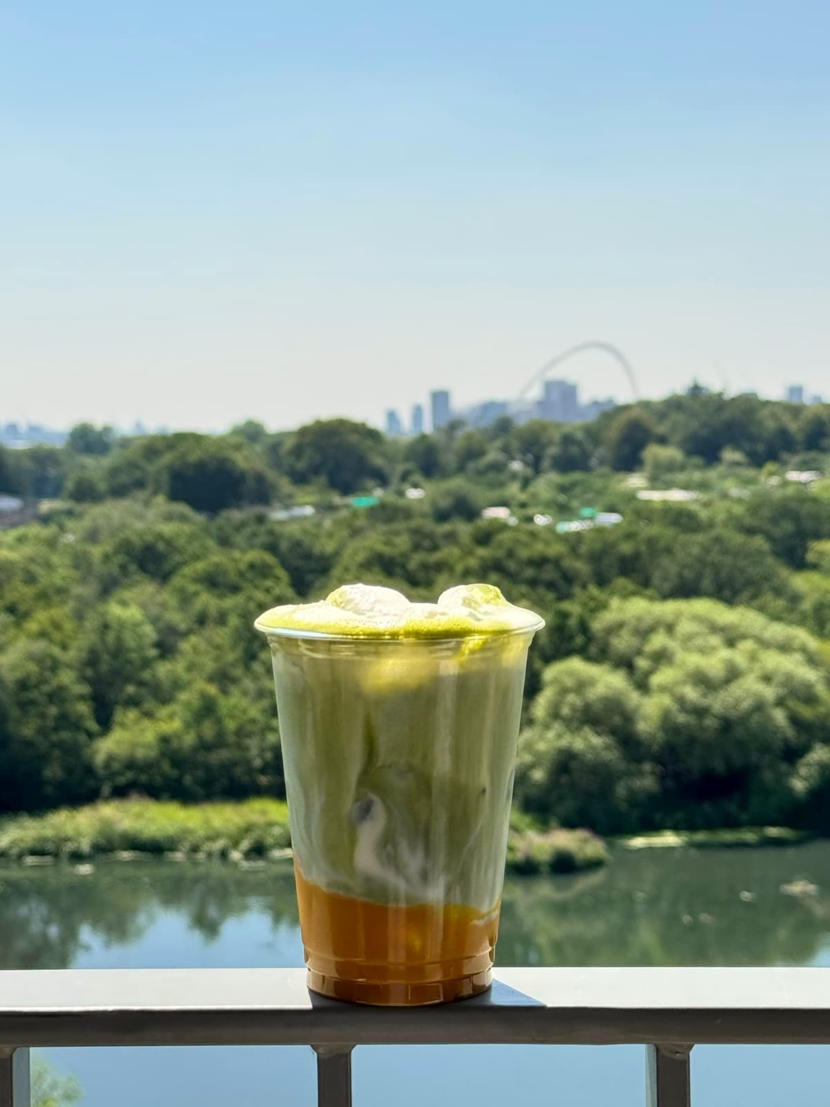 Mango matcha with a view across the water
